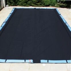 Doheny's Solid Winter Cover For 25x50 Ft Rectangular Pools, 10 Year Warranty, With 18 Water Bags